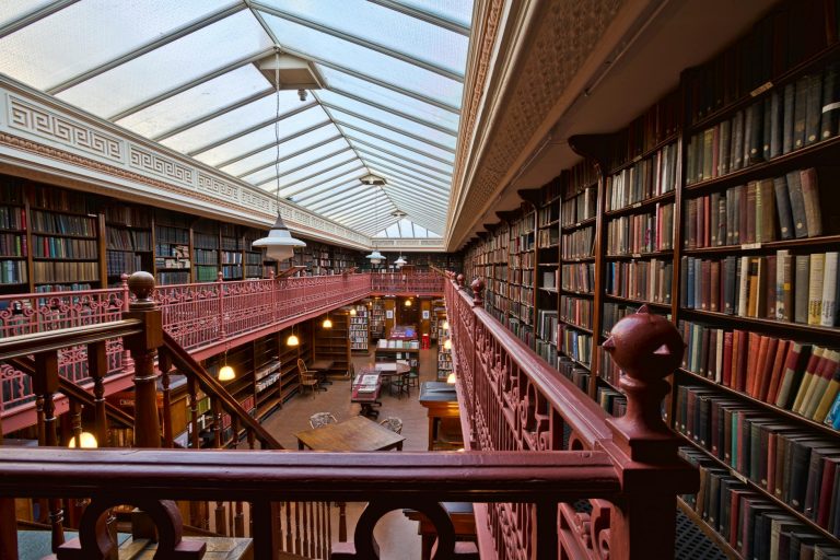 Explore the classic architecture and vast collection of books in this historic library in Leeds, UK.